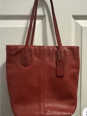 Coach Red/Scarlet LeatherHandbag With Minimum Signs Of Wear.